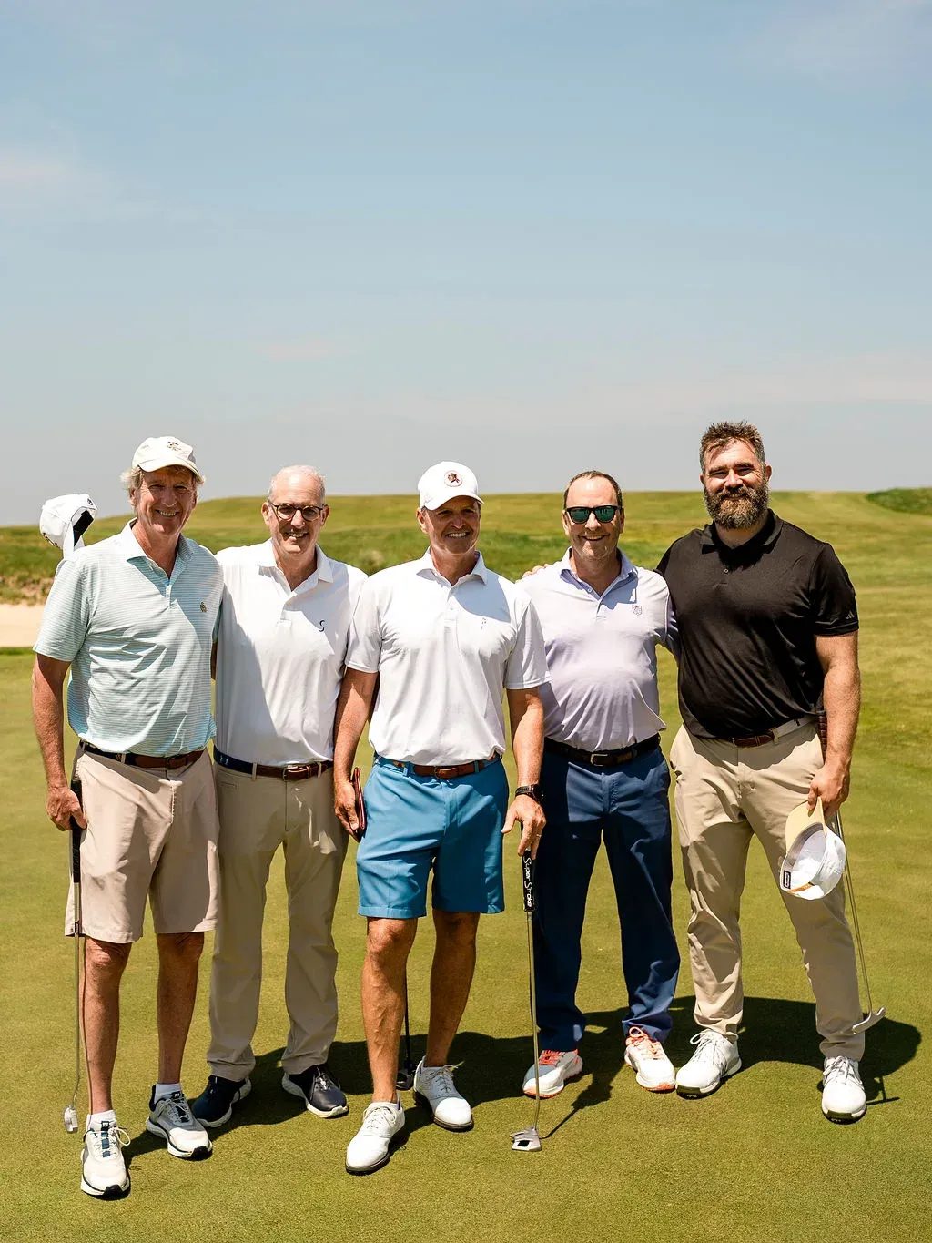 A foursome gathered before their round at the Blue & Gold Classic