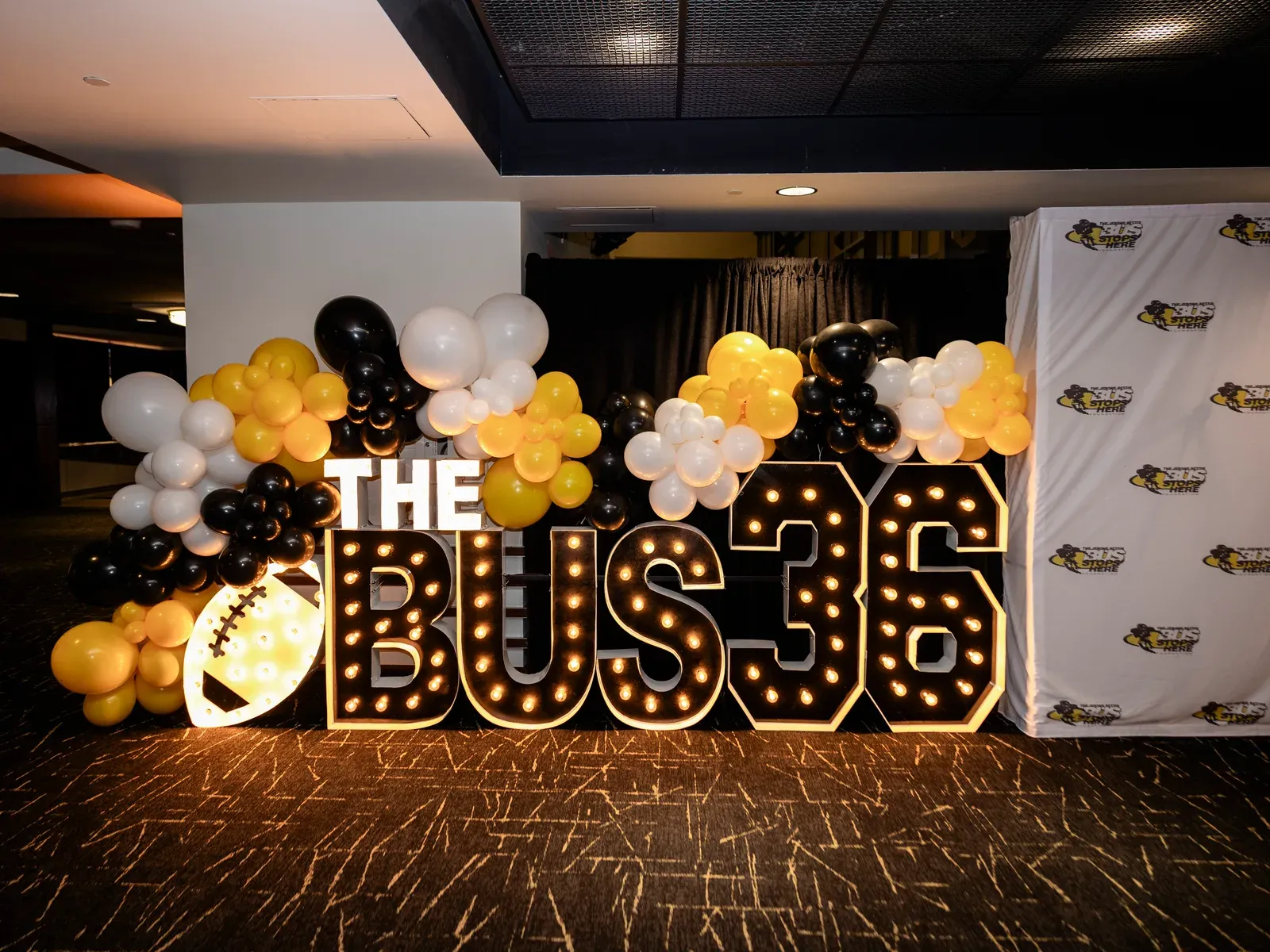 The Bus 36 marquee letters at the Caring for Kids Gala